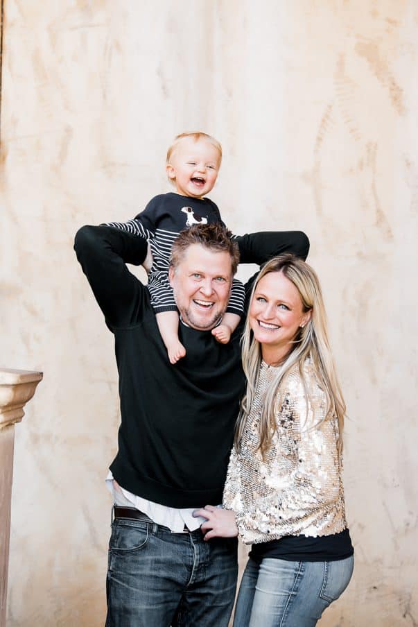 Couple Smiling At Camera With Toddler For A Family Photoshoot In Dallas