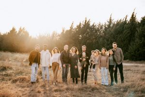 Large Family Photoshoot In Open Field With Beautiful Sunset 
