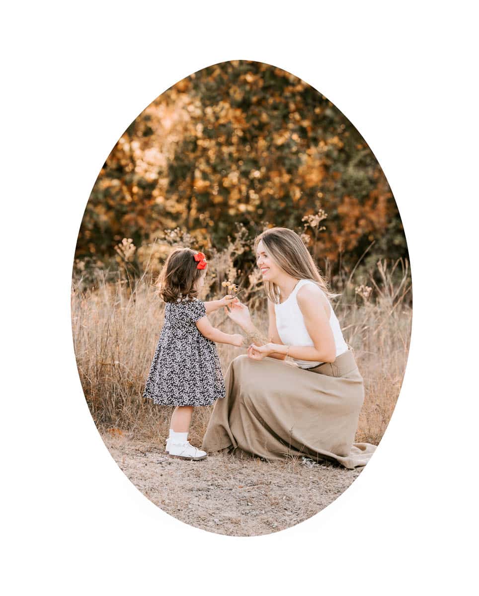 Mini outdoor family photoshoot in Dallas featuring mother and toddler in a natural light field setting